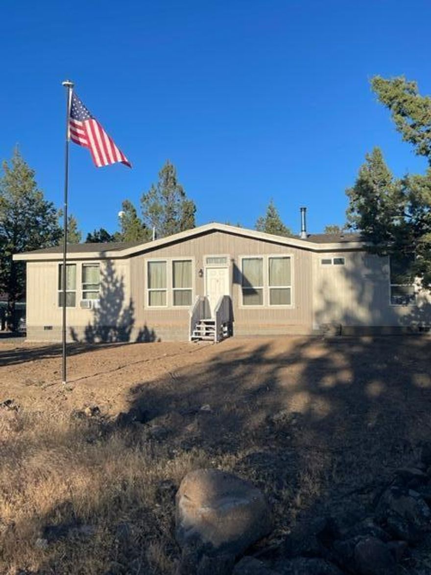 Beautiful Listing in 3Rivers Rec!! 

Escape the hustle and bustle with this extraordinary opportunity to own a spacious 2021 Marlette manufactured home nestled on 5 serene acres of off the grid land. Located in Three Rivers Recreation at Lake Billy Chinook, this property offers the perfect blend of comfort, privacy, and natural beauty.
 Enjoy generous living spaces with Open Concept Living room, family room, and large  kitchen and dining. Large Primary suite  with double sinks and large walk-in shower. Large shop provides plenty of storage for all the toys! 
Cook shack, 8x30 guest trailer with bedroom, plus bonus sleeping spaces for those large groups! 3600 Gal water storage, MagnaSine Solar, 9000 watt propane/gas generator. New septic in 2021. Too much to list on this move in ready home that has been full time residence, but also perfect for vacation/weekender in paradise! Great for multi family ownership! 
Seller is licensed Real Estate Broker in the State of Oregon.