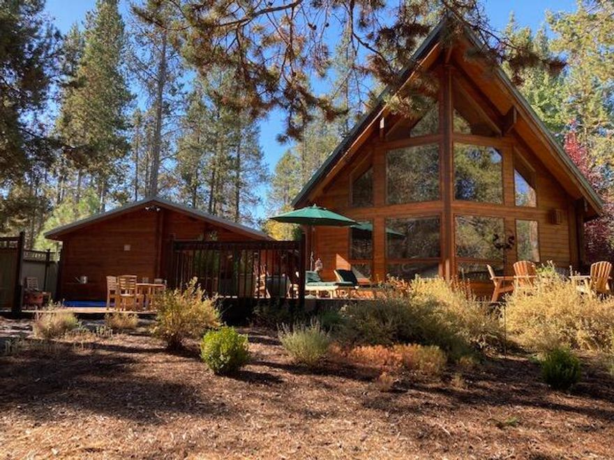 Breathtaking Deschutes river views, home nestled, situated on .57' acres. Waterfront on Big Deschutes River canal, a perfect retreat.  Appreciate the warm and beautiful living room for entertaining large groups. Featuring vaulted ceilings, larger windows, Cedar wood accents.  Generous sized master suite.  2nd Bedroom, full bath on the main floor.  Additional Office space could be converted to a third bedroom with full bath. ADU.  Enjoy mature ponderosa trees, with elevated seating for increditable views. Private backyard water accents to conveniently launch your water toys. Have a cup of coffee with your farvorite book viewing wildlife.  Gather around your private fire pit with friends viewing the river.  Double car garage, space for your RV.  Detached storage building. Short term rentals allowed. Home has community water and sewer, Private river dock, boat launch.  Conveninently location near Sunriver resort for golfing or dining, Mount Bachelor and one of 20 High Lakes recreation a