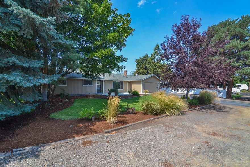 Recently remodeled home with 3 bedrooms and two bathrooms. One bedroom is set up as a den. Living room and also a family room. Craft studio in the back yard. RV parking front and in the rear off the alley. Huge lot. Kitchen has granite counter tops and upgraded cabinets. Fireplace is wood burning and has been updated with new stone. New flooring throughout. Updated vanities in both bathrooms. New interior doors and trim. New paint inside and out.