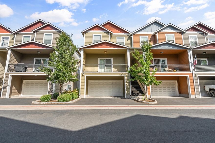 This light-filled and spacious end-unit townhouse sits in a quiet cul-de-sac near shopping and transportation. Beautiful hard wood floors and an open living area that flows into the kitchen. The open kitchen, with granite countertops, a breakfast bar, and dining space, will become everyone's favorite gathering spot. A deck off the great room provides the ideal space for grilling or relaxing. Upstairs, the three bedrooms feel big and bright, with high ceilings and oversized windows to let in lots of natural light. The primary bedroom features a walk-in closet and en suite bath. Storage is abundant--a kitchen pantry, linen closet, and oversized attached garage ensure you'll have plenty of space for your stuff. Low HOA fees cover exterior maintenance and landscaping for hassle-free living. All appliances included. Schedule your tour today!