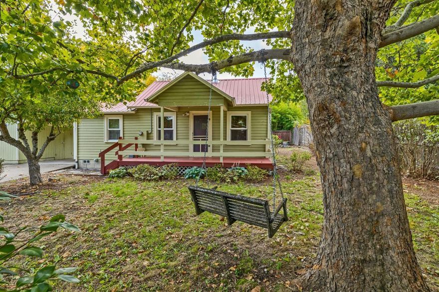 This very sweet cottage space has everything you could want at a rare Ashland price range! Extra spacious yard with mature trees and room to garden all you want. Updates in the home include newer mini splits, kitchen cabinets, attic insulation, vinyl windows, refinished wood floors, gas fireplace. This home is ready to go and for a small space, has so much to offer with two bedrooms and 2 full bathrooms as well as a full laundry room! Super clean and lovely.