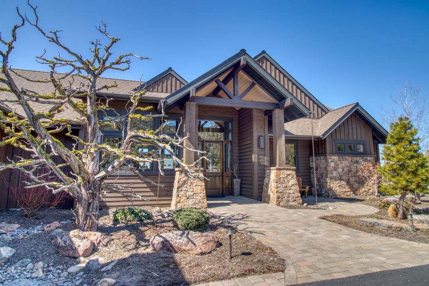 Northwest style home with incredible views of the Cascade Mountains. This one-level home is designed thoughtfully and with much attention to detail, featuring gorgeous custom beam work and vaulted ceilings in the expansive great room area. The kitchen, ideal for entertaining, has a large island, double oven, microwave drawer, two sinks, ample counter and storage space and a walk in pantry. All bedrooms feature en suite bathrooms allowing guests additional privacy. The master suite, complimented by a beautiful master bathroom, is situated on one side of the home and has vaulted ceilings and gorgeous Cascade Mountain views. A large family room and office complete the home. The garage features a small shop area to tinker on projects and as you enter the home from the garage, you are greeted by a mud room. The outdoor living area offers a covered deck, outdoor kitchen and is the ideal space to take in the views and watch the incomparable Brasada sunsets.