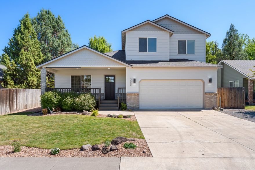 Beautifully updated with timeless charm in NE Bend! This 3-bedroom, 2.5-bath home features a welcoming front porch and a main-level primary suite designed for comfort and privacy. Stylish updates throughout include luxury flooring, fresh interior and exterior paint, modern light fixtures, new kitchen cabinetry, upgraded bathroom vanities, and a new roof! The large, fully fenced backyard offers ample space for entertaining, gardening, or play, and there is room on the side of the driveway to park a boat, trailer, or small RV. Situated in a desirable NE Bend location close to parks, schools, and shopping, this home blends classic curb appeal with move-in-ready convenience.