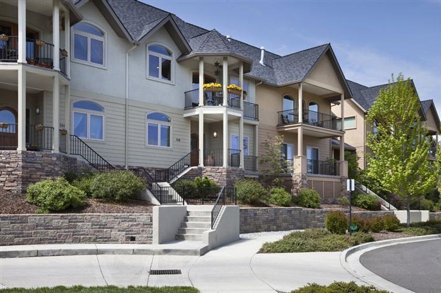 Elegant lines, beautiful natural light and upscale sophistication of this fabulous townhome. Vaulted ceilings, gorgeous hardwood flooring, recessed lighting, open concept design and rich use of natural materials create a wonderful interior. All main living areas are open to the stunning mountain and valley views. Gourmet kitchen, stainless appliances & double oven gas range. Spacious MBR suite. Two additional bedrooms and total of 2 baths. Dual zoned heating. Nice outdoor space with extended paver patio & walkway. Very serene setting. Double garage. Open common areas and park.