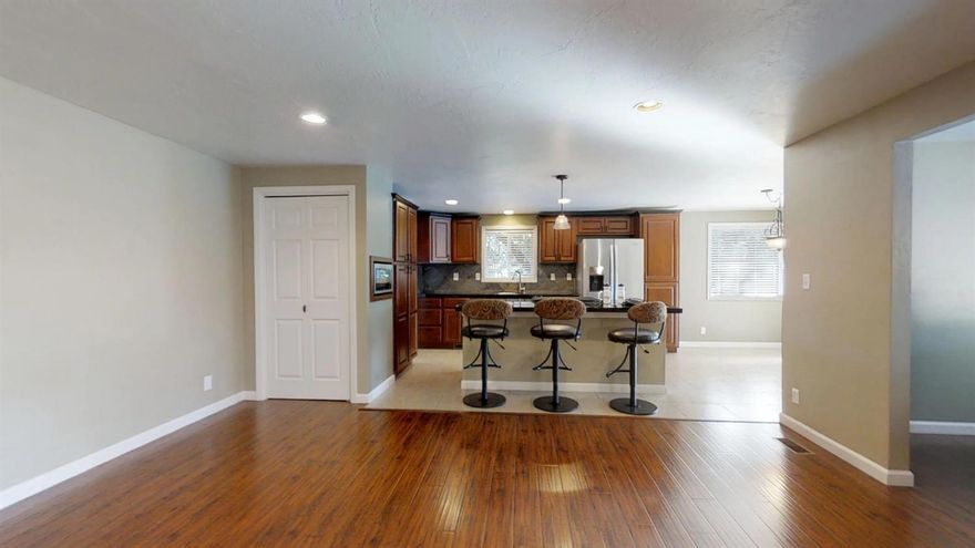 Very spacious home that sits on a large 0.38 acre lot. The backyard features a salt water pool.