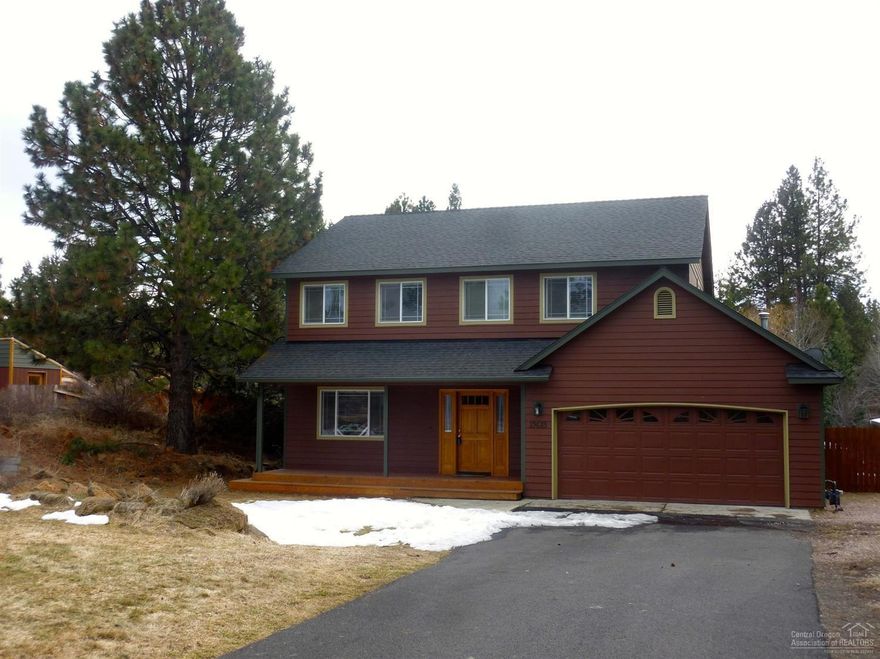 This is the place you will want to call home! Unwind on your paver patio w/ pergola & enjoy the privacy on the landscaped half acre lot. Plenty of room for RV parking, extra driveway. Great curb appeal with covered front porch. Inside you will find four bedrooms (all upstairs) & laundry room is conveniently upstairs also. Lots of room for entertaining or enjoying loved ones in the living room & family room. Gas fireplace w/ updated tile for those chilly nights. Heat pump to stay cool in summertime!