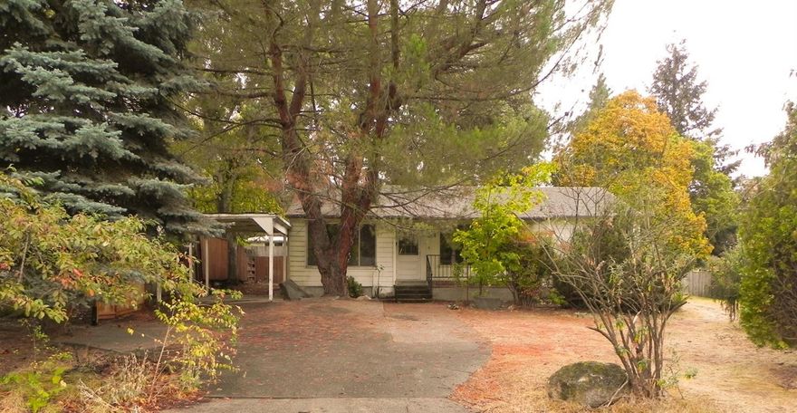 ) Location, location, location. Nestled in a quiet, established, east Medford neighborhood. 2 bedroom, 1 bath plus family room. This is for the contractor looking for a winter project or an investor searching for the perfect flip''. Start with a fireplace, hardwood floors in living and bed rooms, tile floor in bathroom, FAG heat, newer sink and countertops in kitchen. The rest is waiting the Buyer's personal updates and creativity. Priced and being sold AS IS''. Seller to make NO repairs or concessions for repairs.