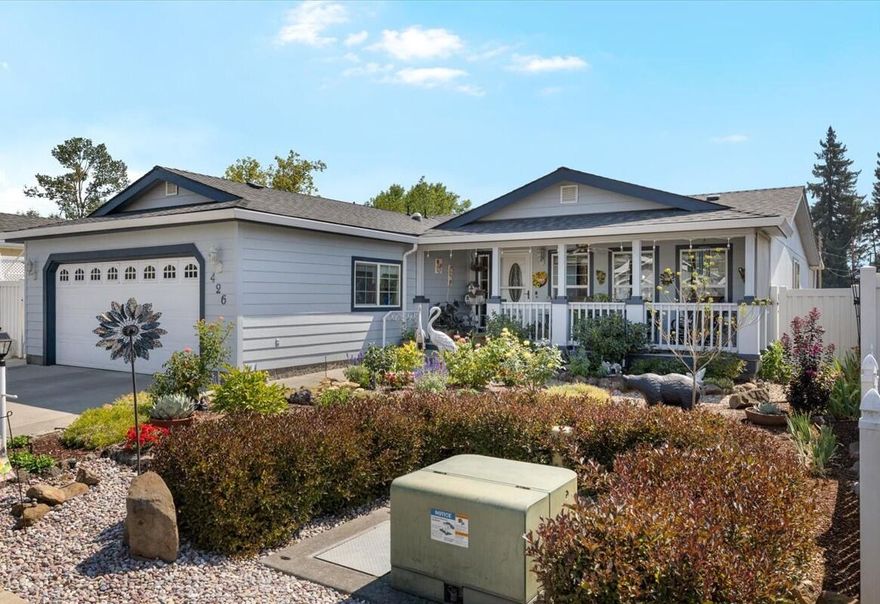 This 2 bedroom, 2 full bathrooms & 3rd bonus room (office, den or craft room)2004 manufactured home is located in the desirable Miller Estates 55+ community, 1716 sq. ft. home with an attached 2-car finished garage featuring storage cabinets. The property boasts a beautifully landscaped, low-maintenance front and back yard w/sprinkler system. A new roof 2024, and the HVAC system was new in 2023. The kitchen includes granite counters, under-cabinet lighting, a trash compactor, pull-outs, and ample storage space. The home has vaulted ceilings, solar tubes for natural light, and two primary bedrooms. Patio sliding door has between glass blinds for easy care. Enjoy the covered front and back decks. Miller Estates offers a private park for residents to enjoy.