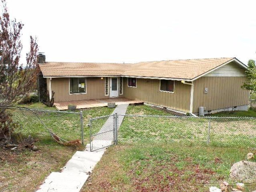 Gorgeous Cascade Mountain views from your back deck! This home features 3 bedrooms and 2 bathrooms on the main level, with kitchen, dining area, and spacious living room with vaulted ceilings and fireplace. Daylight basement has 2 more bedrooms and 1 bathroom, plus family room. Situated at the end of a quiet cul-de-sac on 1 acre, fenced and landscaped with over 800 sqft of decks and detached 2 car garage. This is a Fannie Mae Homepath property!