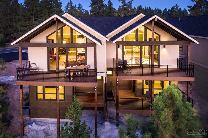 Located on a bluff with spectacular Cascade mountain views lie these quality constructed townhomes. This is a one in a kind opportunity to live in the treetops & still have an easy walk to the Old Mill District for shopping, dinner & a movie. Each 3 bed, 2 1/2 bath unit features a great room, family room, office, 2 fireplaces, a 2-car garage & parking space. You can easily find yourself at home on one of the two decks overlooking an unforgettable sunset! Photos of similar unit, specs vary per unit.