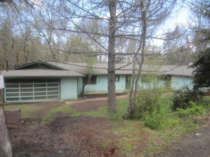 This is a Fannie Mae Homepath property. Great location with amazing potential on 1 acre. Large living area with cozy fireplace. Good size kitchen. Spacious bedrooms.