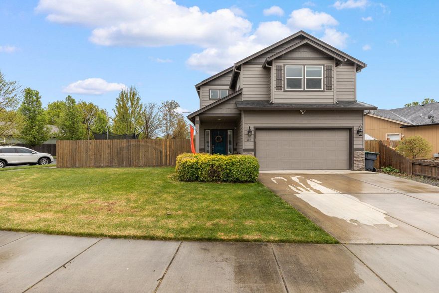 WHOLE HOUSE ELECTRIC SOLAR SYSTEM INCLUDED! ($35,000 VALUE) W/FULL PRICE OFFER Power bills will be low! Stunning home in extremely desirable Candlewood Community. Near Jacksonville Elementary School, Britt, Jacksonville, Medford, the Airport, & I5. HUGE BONUS *Sellers Recently Added a Complete Home Solar Power System* Corner lot with community park right across the street. Excellent floor plan & design, the home boasts power under eaves for holiday lights, gas hookups on the back patio, and a bonus room perfect for a home theater or additional bedrooms. The gourmet-style kitchen has granite countertops, custom cabinets, stainless steel appliances, plus more. The master suite offers breathtaking views, while the fenced backyard with covered patio, hot tub, and dog run provides plenty of space for play and relaxation. 2-car finished garage has been converted to a perfect exercise room w/newly installed ductless heating/air conditioning ($6500 value). Don't miss this exceptional property