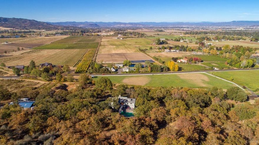 One-of-a-kind So. Oregon Property! Located just outside of Jacksonville, OR sits this very unique and usable estate with private and gated access. With a custom 5080 sq. ft. 2 story home (with basement), this is an ideal venue for at home health care business, or multi-generation family situation. Over 12 acres is dedicated to a thriving horse set-up with 9000 sq ft outdoor arena, barn w/ runs, wash rack, tack room, & water heater plus vinyl fenced horse pasture. An ideal spot for a much needed horse boarding facility that would bring $300-$450 per horse/month. An additional 8 acres goes to the top of Bellinger Hill with nearly 360 degree unmatched valley views. This would be the spot for a tasting room or small B&B! Built in 1989 the large comfortable family home consists of 6 beds, 4 baths and living areas on each floor, 3 fireplaces, 2 master suites, and 2 kitchens make this very unique. Priced below tax assessed value. Zoned EFU allows many uses. Seller's are Very Motivated!