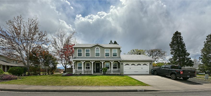 Unique, recently updated, charming home in desirable East Medford. 4 bed/ 2.5 bath, & plenty of outdoor space. Newer flooring, interior paint, & light fixtures throughout, as well as a partially remodeled kitchen.Walkin in is a quant light/bright sitting area that flows into the formal dining. Next you come into the open kitchen w/ stainless appliances & plenty of storage space in the traditional white cabinets. Just off the kitchen is the large living room, w/ a sliding glass door to the huge well manicured backyard. Large primary suit w/ a barn door entrance to the primary bath/ walk-in closet area. All bathrooms have newer marble counters, & countertop to ceiling mirrors. 3 remaining ample sized guest rooms, +office space. This .22 acre lot has plenty of additional parking w/ an entire fenced in graveld space for all your recreational vehicles even has a detached shop, & updated exterior paint all around. Covered patio, well manicured landscaping & so much more!