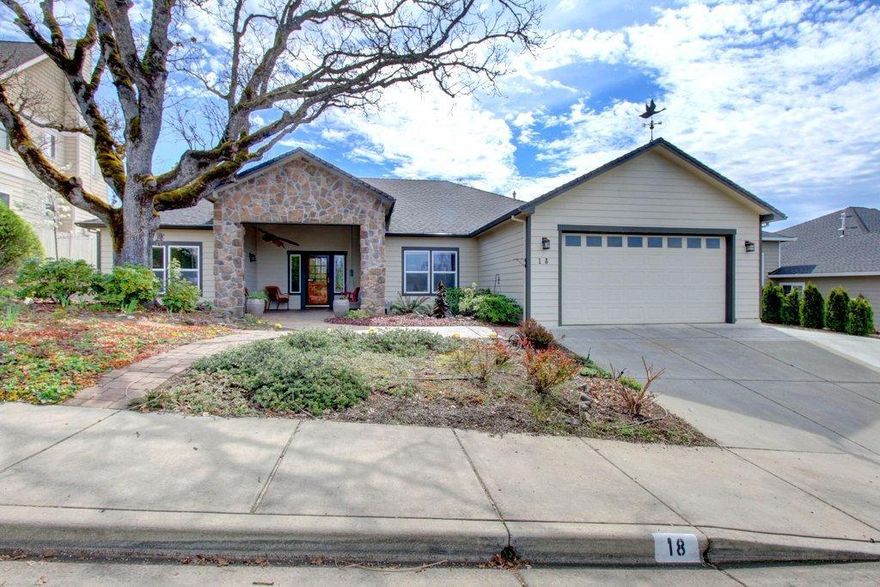 Spectacular Home & Location * Shows Perfect in Every Way. This 3 bdrm/2 bath + bonus room/office is a single level, split bedroom floor plan w/gorgeous views. Newly remodeled w/granite countertops, Stainless steel appliances, real hardwood flooring, custom pull-outs in cabinets, floor-to-ceiling rocked gas fireplace w/custom wood mantle, custom paint, surround sound wiring, custom cabinets, ceiling fans, custom blinds throughout & custom lighting. French doors to office w/coffered lighted ceilings, custom-built storage building, stamped concrete & incredible outdoor kitchen w/sink. Huge Master suite w/coffered lighted ceiling, huge walk-in closet w/custom shelves, bath w/dual sinks, heated tile floors, jetted tub & large custom, dual-head, tile & glass block shower. Oversized, heated 2-car finished garage, large laundry room + more. Professionally landscaped front & back yards w/high-grade synthetic turf, raised flower beds, water features in front & back, a must tour!