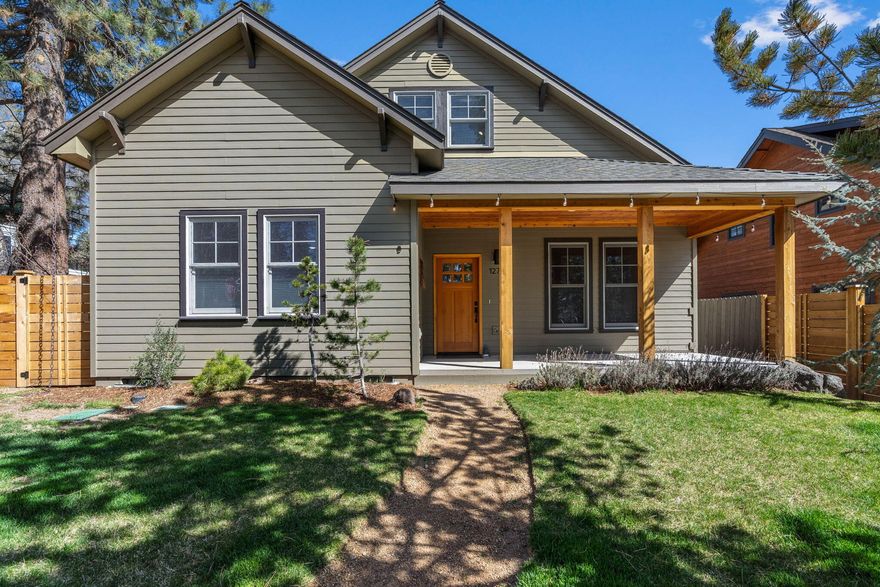 Exceptional home on a prime corner lot in one of Bend's most desirable neighborhoods. This thoughtfully designed open floor plan features a spacious primary suite on the main level, while upstairs offers two charming bedrooms and a versatile bonus room ideal for a home office, media space, or playroom. With abundant storage throughout, this home effortlessly combines practicality with style. Just minutes from an array of dining, shopping, and all the vibrant amenities that Northwest Bend has to offer. The interior showcases exquisite solid wood doors, beautiful hardwood floors, sleek concrete countertops, and stainless steel appliances, creating a perfect blend of elegance and modern living.