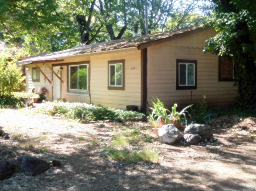 Good opportunity to take advantage of a frame built home, 3bd 1 bath, 1130 Sq. ft. on .20 sizelot, with possibility of a 2 family set up, as there is another .28 acre city lot adjacent, included in this purchase. Both lots are level, partially fenced, paved road frontage. Currently used as a rental, but your choice as an investment, or live in it yourself. Big trees, mature shrubs, close to schools, library and other town conveniences.