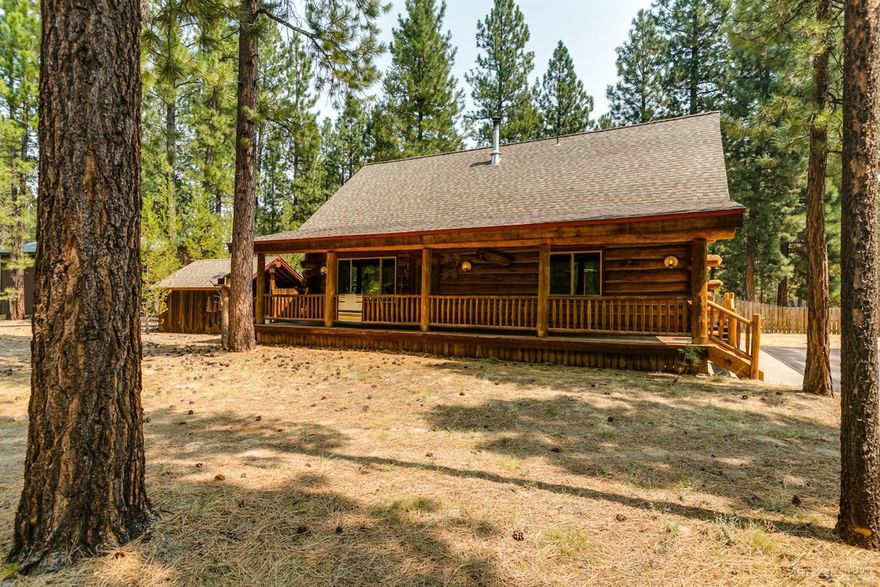 You will never find another one like this! The logs were handsawn and horse-logged off Crater Lake Nat'l Forest. Rams, a front door with precious metal panels starts your journey. Continue on distressed Brazilian heart pine floors. Experience knotty hickory cabinets, granite counter-tops, and custom rustic lighting throughout, named, numbered & signed by the artist. Home offers a warm cozy feel with enameled wood stove. Community club house, pool, and river access. Come float the river or fish.