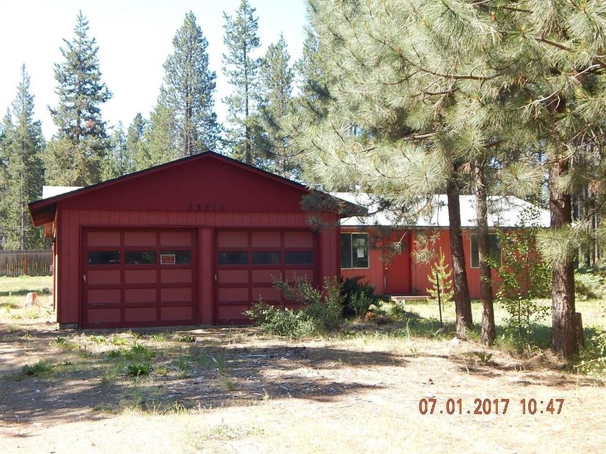 As Is Sale, Investor Special! Just off a paved road on nice sized lot. Single level home with fireplace and attached double garage. 3 bedrooms, 1.5 bathrooms, 1344 sq. ft., .89 acre.
