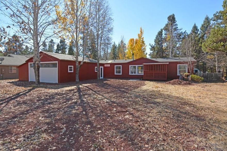 New exterior and interior paint, new luxury vinyl waterproof plank flooring, new kitchen counter tops, stainless appliances, new bathroom floors & counter tops, detached garage, off a paved road, community sewer and water. National Forest, Big Deschutes River access and boat ramp in the community. This home is priced to sell.