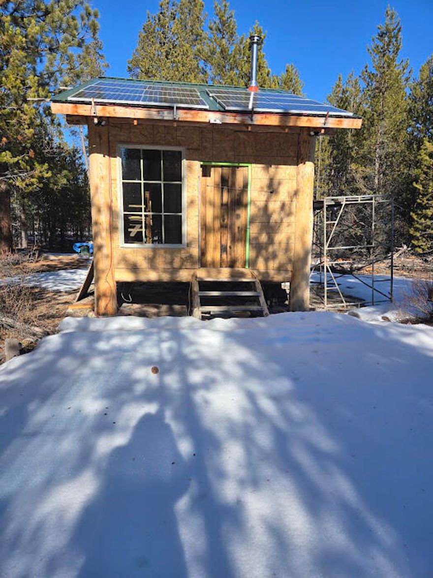 Off the grid hunter's delight with ample game trails. As you drive up to the property you'll realize how private this spot is. Features view of the Williamson River Valley from the north end. Seller says the well provides 100 gpm. Some sub-irrigation at the north end. From this property, you can easily access and explore the stunning surroundings of our public lands. This parcel borders Forest Service land on the South and SouthEast sides, a large ranch on the North side, and two 40 acre parcels. Diesel and propane delivery is available. In addition to a storage shed, there's an outhouse with a holding tank and a solar panel and battery setup for the on- site well.