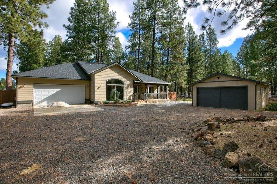 Looking for a well priced, stick built, single level home on just under an acre with a 2 car attached garage, tool shed AND a 24x24 insulated shop? House has 10' ceiling fans for optimal air flow. Beautiful, level, backyard oasis with pergola and privacy wall. Almost an entire acre is fully fenced in on all 4 sides. Great separation between master and the other two bedrooms.