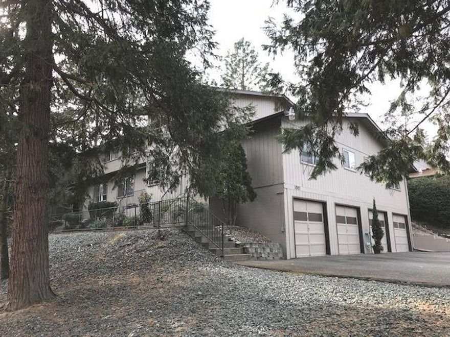 Investor Alert! A rare opportunity to purchase a well maintained 4-plex in the Northwest area of Grants Pass! Set on a nice corner lot, these are 2 bedroom townhouse style units, two with 2 bathrooms and two with 1.5 baths, two with patios, and all four with their own laundry hook-ups and oversized, single car garages! City services, city schools, great location and long term established tenants. Shown by appointment only! Please do not disturb tenants.