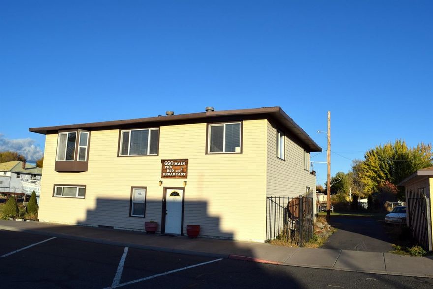 Opportunity knocks! You decide: two residences, rental homes, or keep the business. Established bed and breakfast with additional owners house for sale in the quaint town of Tulelake, California. Main house has four bedrooms, two bathrooms, plus a half bath in the lower unfinished walk-out basement. The owners house is a two bedroom, 1 bath block home that is currently rented. Also has a 900 sqft shop on the 1/2 acre parcel. (Main house is available fully furnished.)