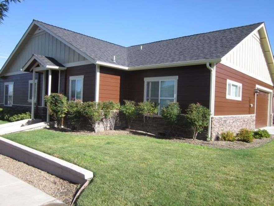 Here is a great opportunity to own a single level, two-bedroom two bath home in East Medford at a Great price. This 1500 sq.ft. home has hardwood floors, tile entry, hardwood cabinets, granite counter tops, vaulted ceilings with shelves for plants or decor, gas log fireplace, covered patio with fenced back yard, two car attached garage and lots of windows throughout. This is not a shared wall unit.