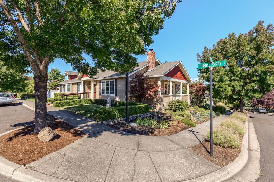 Come home to comfort in this 3 bedroom home tucked away on a quiet corner of a popular neighborhood with several green spaces. This spacious single level home has just a couple steps down into a high ceilinged great room that features an open kitchen with a large island, crafted wood beams, a gas fireplace and large windows with views of Grizzly Peak. French doors lead out to a covered deck with a built in bbq, an additional deck and patio spaces that enjoy picturesque privacy. The outdoor enjoyment continues under a wisteria covered arbor on the private patio outside the French doors of the master suite. The sunny master bath boasts a walk-in shower as well as a soaking tub, enclosed toilet and double sinks. An oversized two car garage off the alley provides lots of storage and means there are no neighbors on three sides. It is certainly easy to enjoy this bright and beautiful home in a neighborhood made for strolling tree-lined streets or relaxing in a park just across the street.