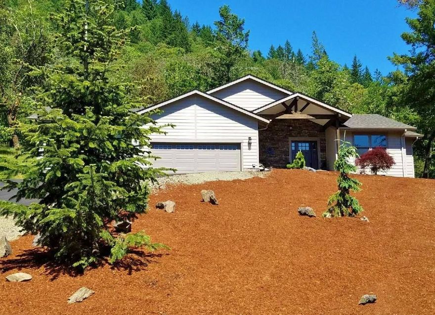 SELLER SAYS SELL NOW! Built in 2018, this custom home was designed to take in mountain views, tall Evergreens & big sky. Watch Osprey fly to the Applegate River below. Not only does this home have 3.49 acres, but you also own 2.6 acres of your own riverfront along with 9.44 acres above the 4 properties in Salmon Run Estates, ensuring total privacy! You can fish or raft, swim or just take in the beauty of the river right out your door step when ever you desire. The home site is perfectly placed for enjoyment of the 15.66 Acres. Each room in this home has a view! The open floor plan is comfortable & inviting. Custom features abound, from the Impressive over-sized entry door, to the central Vacuum, Hardwood floors, Knotty Alder doors & trim, travertine flooring, hammered copper sink & custom back splash in the designer kitchen with its eat-in counter. The pellet stove is beautiful as well as an efficient source of heat. 860 SF garage is a bonus! Features list provided.