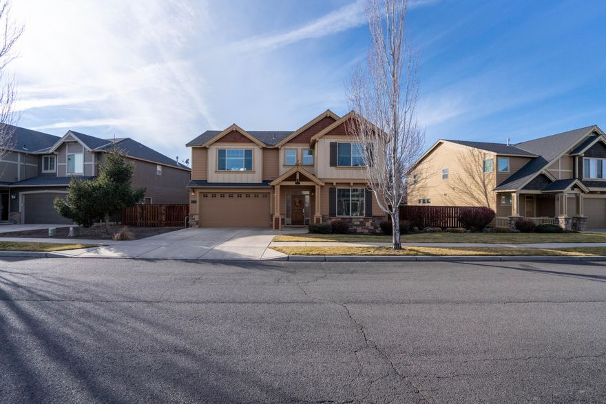 Back on the market. Hard to find spacious home in established NW Redmond neighborhood. Home has an open floorplan with a great room, natural gas fireplace and flex space that could be utilized as an office or extra bedroom. There's also a huge bonus room! The stunning master suite includes a walk-in closet and ensuite with a double vanity and soaking tub. Rounding out the home itself is a must-see custom garage set-up with built-in storage and tile floors. The spacious lot has a large private landscaped backyard with a sizeable patio space and backs to the canal and a neighborhood walking trail. Neighborhood amenities include a community pool, park and play area.