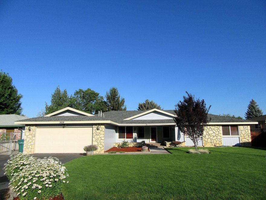 Great value on this beautiful home in desirable Sunset. 2,202 sq.ft. with a large formal living room and formal dining room, plus a family room with rock fireplace. Kitchen has nice painted cabinets and new cook top, double wall ovens and refrigerator, eating bar and a breakfast nook. Also featuring 3 large bedrooms and 2 full baths. Gas F/A, A/C and a big utility with pantry. 2 car garage, covered entry with double doors, patio, storage shed, and fenced back yard.