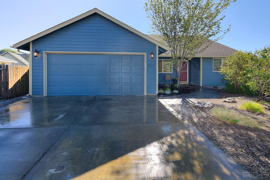 Rare find in NW Redmond! Cul de sac location w/all NEW finishes & paint, Stainless appliances, Slab Granite counters & undermount sinks, Laminate, Premium Carpets & a touch of Industrial style. Great room plan & island/bar. Enjoy the covered front porch, low maintenance landscape & massive back yard. Spacious rooms, over sized closets, Baths w/tiled floors & more granite. The list goes on. RV Parking if you remove a few trees or keep the privacy! Fully fenced, oversized garage, A/C & even a doggy door.