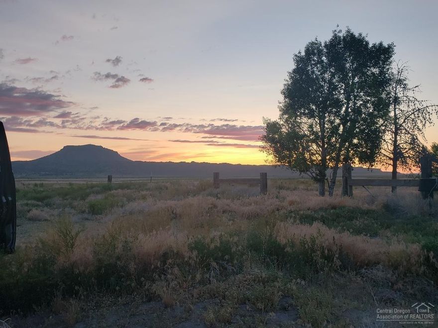 Make your dreams a reality? Just imagine the possibilities this 320 acre fenced parcel will give you! Here you will find a 2,200 sq ft home plus a huge hay barn 75x250 a shop that is 40x60 with 3 phase power with attached carport. Ground was used for cattle and hay. Only 1 mile from paved road and 90 mins. from Bend. Wildlife,starry skies, gorgeous sunsets and Indian artifacts await you.There are two wells one house and one irrigation. Don't let the deal of the century pass you by.