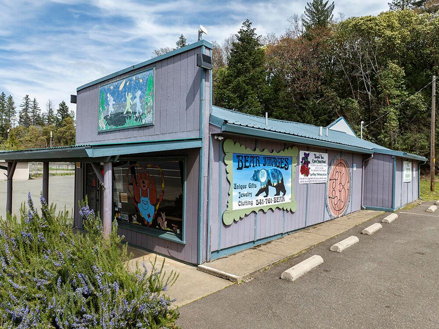 Awesome Commercial Property located right in the Heart of Cave Junction! Anchored by the Very Busy Dutch Bros Stand to the South, this Property has Maximum Exposure & Easy Access. The Frame Built Commercial Building sits on a .19 Acre Parcel in Two Tax Lots, & offers an Excellent Open Retail Space, plus a Bathroom & Rear Storage/Stock-Room Area. With an Annual Average Daily Traffic Count of over 7,500 Cars per Day, & with Cave Junction being the First & Last Substantial Town in Oregon with Travelers on Redwood Hwy, this Property has the Capacity to Serve your Commercial & Retail Needs! The Property offers Six Dedicated Parking Spaces, plus Additional Parking Area. The Building comes with a Metal Roof & Installed Security System. This Property was home to a Long-Term Successful Business that was in Operation for over 40 Years! If you have been looking to make your Entrepreneurial Dreams a Reality, don't miss this opportunity. This Property is Move-in Ready for your New Business!