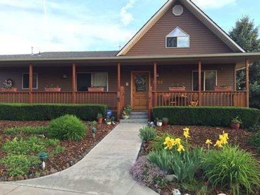 One Party Listing: Two story daylight basement design with southerly exposure and fabulous Basin Views. 3201 square feet per appraiser with large rec or hobby room downstairs and a bedroom/office with private bath that could make a second master suite. Includes upper garage and lower garage/shop, both accessible by driveway front and back. The home is completely handicapped accessible with large doorways/hallways for wheelchair access. Elevator gives easy access to both main floors of this house. Third story loft offers a bright retreat with lots of sun. The sunset view of Mt Shasta is breathtaking. Enjoy it from the second-story deck or through the floor-to-ceiling living room windows. The two car basement shop provides tons of storage and work space for all hobbies. The well kept yard boasts mature fruit trees. Nearby hiking trails and Steen Sport Park provide outdoor activities for the whole family.