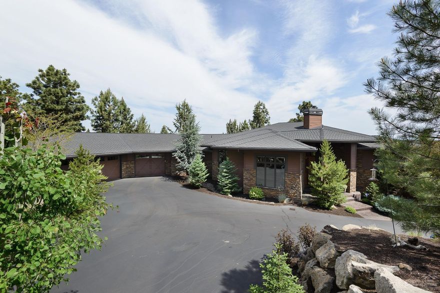 Amazing custom home on 1.77 acre lot on Awbrey Butte w/beautiful views! Attention to detail throughout with master on main, 2 bedrooms with private baths, 3 half baths, den, bonus room w/fireplace, wine cellar, exercise room. Spacious great room w/stone fireplace & built-ins. Kitchen w/commercial style appliances, built-in refrigerator, pantry, eating bar & butler's pantry. Private entertaining size covered deck w/built-in BBQ cooking area. Extensive landscaping w/fencing. Oversize 3 car garage w/built-ins.