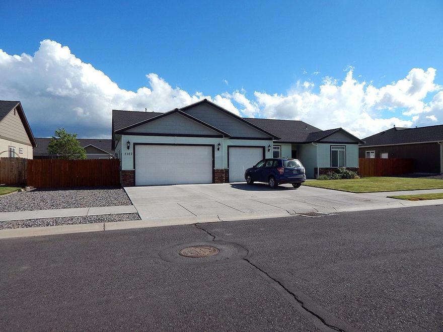 This exquisite home built by Tom Soyland has all the amenities that one would want. Hickory wood flooring, to decorative tile in the entry way, this home was tastefully done. This home features a nice kitchen which opens up into the dining and living room areas. This home features a master suite with and oversized walkin closet and french doors that lead out to the back deck. Easy to show