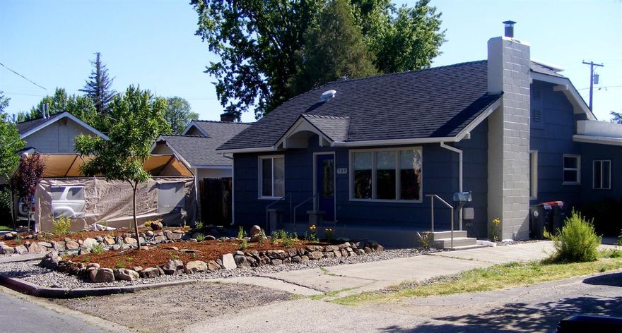 This 2 bedroom, 1 1/2 bath home with Bonus Room features Brazilian hardwood, ceramic tile flooring, great floor plan and on a quiet, no-through, traffic street. Truly a nice starter home or investment property. New (2014) roof, new interior and exterior paint. New electrical panel and new energy-efficient, double pane windows. Easy access to additional attic storage, extremely well insulated home and plenty of room to build a garage/shop and possibly additional living area. Fenced yard, storage shed and covered patio. Pictures show vacant however, it is occupied.