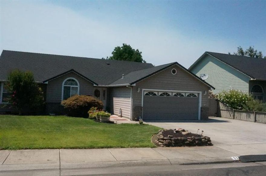 Meticulously cared for, Move-in Ready home! Beautifully landscaped fully fenced yard w/garden shed. Expansive Master bedroom features large bath w/walk-in closet. Vaulted ceilings throughout the home, gas fireplace and built-in shelves in the spacious living room opening up to formal dining area and spacious kitchen. Sit on the huge covered porch and enjoy your large private backyard. Parking on side of house for RV and toys. Conveniently located near shopping and schools. This 3 bd/2ba home was built in 2000 and has been loved and cared for ever since. According to the city of Central Point this address is not in a flood plain and no flood insurance is required. It's designation is X. Buyer to do own due diligence.