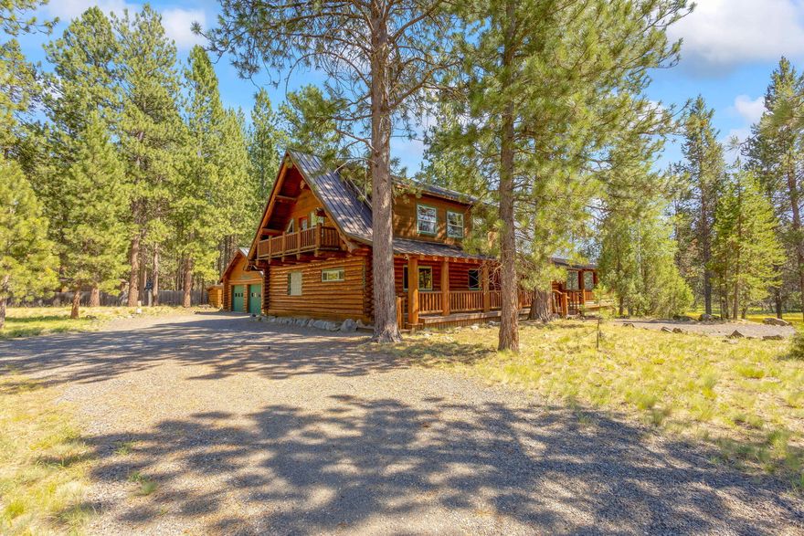 Three bedroom, 2 bathroom log home sits on 0.82 acres just outside of Sunriver! This 2,880 sq ft home features an open floor plan, soaring ceilings, and expansive windows that fill the space with natural light and offer peaceful canal views. Step out onto the wraparound deck to enjoy the sights and sounds of the Deschutes River. The kitchen includes a center island perfect for entertaining. The primary suite offers a walk-in shower and jacuzzi tub. A spacious loft serves as the 3rd bedroom or bonus area. Oversized detached 2-car garage with room for all your gear. Located close to Mt. Bachelor, high lakes, and endless trails, this home is the perfect Central Oregon retreat.
