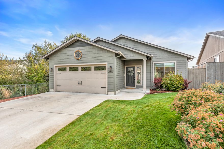 Tucked away in a peaceful Southwest Medford community, this lovely 3-bedroom, 2-bath home offers a welcoming and comfortable space and the open floor plan, vaulted ceilings, and large windows create a bright, airy feel throughout the home. In the kitchen you'll find beautiful granite countertops, soft-closing cabinets, and an abundance of storage. The primary suite is a true retreat complete with a large walk-in closet and ensuite bathroom and the two guest beds are generous in size and perfect for a growing family or even a home office. Outside you'll find custom fencing and plenty of room for outdoor relaxation and entertaining. Don't miss your chance to make this house your home, schedule a tour today!