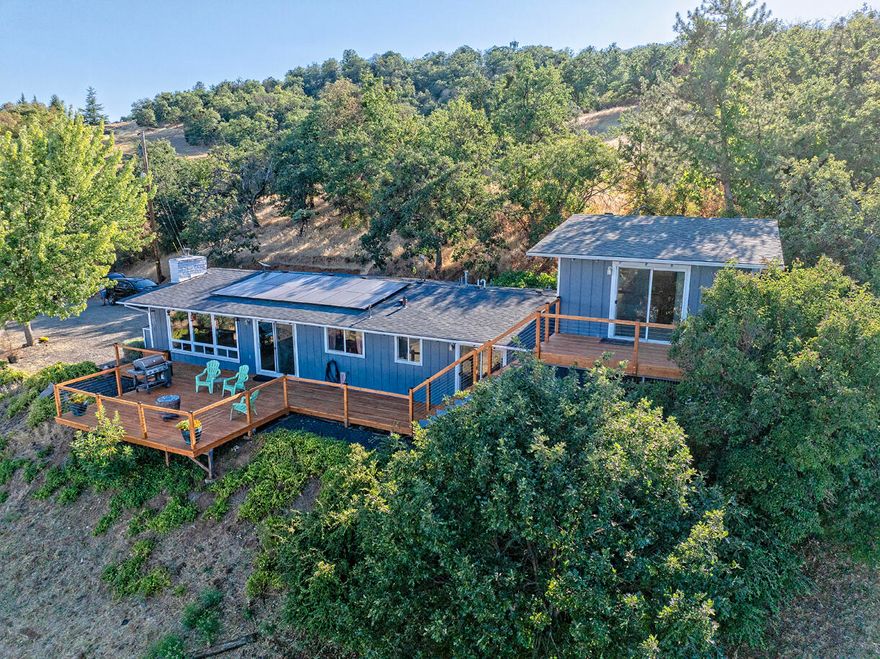 Great opportunity to own a well-maintained home on a spacious 2.32-acre lot in Central Point. Since 2014, the property has received numerous internal and external improvements, enhancing both functionality and appeal. The home features a practical floor plan with 2.5 bathrooms and solid mid-century construction, offering comfortable living with room to make it your own. Set in a peaceful, country setting with space for gardening, animals, or outdoor hobbies. Conveniently located near schools, shopping, and Highway 99, this property blends rural living with everyday convenience.
Grid-Tied Solar System comes with the house and saves on average $250 per month on the power bill.