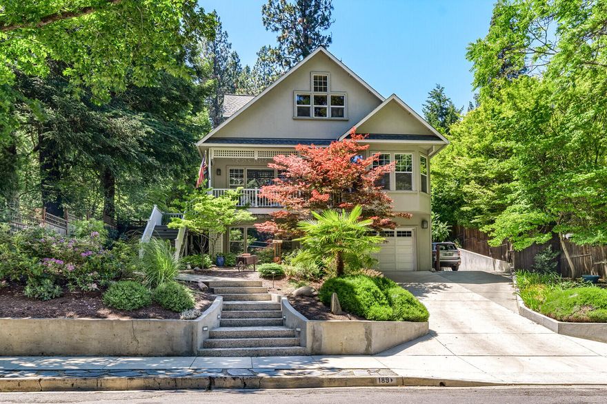 Wonderful contemporary home overlooking Lithia Park. This home has it all and sits on Ashland's premier street- just a short jaunt through the park to Ashland's plaza. With a welcoming front porch one can look over the park before entering the light-filled great room with hardwood floors and a fireplace. The kitchen has a large island with top end appliances, making this an entertainer's dream. A wonderful media room and sun room with custom built-ins are fantastic spaces on the main level. Upstairs is a private and spacious primary suite with sitting/office area, walk-in closet, large en suite bath and views of the park- a true oasis. The lower level has an incredible game room/guest suite, making use of reclaimed wine tanks to create a truly unique space. It also has it's own full bath and entrance, creating a the perfect guest suite. The grounds are stunning, especially the backyard with flagstone patio, terraced gardens, fire pit and water feature. Come see for yourself!