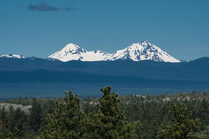 Unobstructed Mountain Views. Incredible Prairie Style single level. Open concept with skylights, many windows. Maple flooring & cabinetry. Kitchen slab granite island & counters. 2 pantrys, 6 burner Viking(propane) stove, double ovens, informal dining area. Master suite w/propane fireplace. Travertine flooring & shower. A/C. Fenced back yard. 3-car garage, lots of acreage for RV parking.