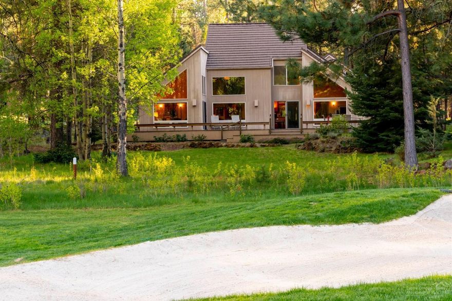 Incredible setting! Nestled in an Aspen grove with views of Black Butte.3237 sf home adjacent to 14th green of the Big Meadow Golf Course. Light, bright and contemporary with 4 bedrooms (2 of which are master suites on the main floor), 4 baths, large kitchen with granite counter tops & stainless-steel appliances. Living room has stone wood burning fireplace, large windows overlooking back deck, golf course & Black Butte. Over sized 2-car attached garage with bonus room above.