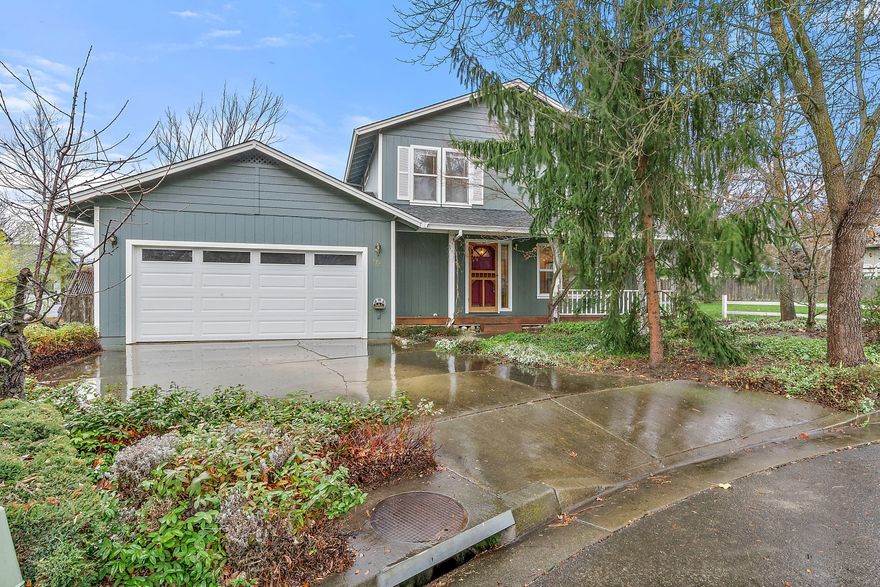 Charming home on quiet cul-de-sac in a wonderful south Ashland location. The front porch welcomes you into this 3 bedroom 2.5 bathroom home. The light filled living room has windows that overlook the open space that sits next door. The kitchen and separate eating area overlook the private backyard that has a large deck that is perfect for entertaining or place to unwind. There is a half bath downstairs and the attached two car garage connects to the living area making an easy transition into home. Three bedrooms sit upstairs. A full bath is shared by two bedrooms. The primary bedroom has a vaulted ceiling and views of Grizzly Peak. A large en suite bathroom rounds out this lovely space. The quiet cul-de-sac is located next to two open spaces that are great play areas or place to enjoy peace and quiet. The south Ashland location is just a short jaunt to Clay St. Park, Shop N Kart and other shopping. A great opportunity.