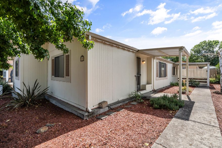 PRICED TO SELL AT GREAT PRICE!  Move-In Ready Home in 55+ Rogue Valley Mobile South Park.  3-bedroom, 2-bathroom home w/ comfort, convenience, & charm all in great location! Bright & inviting living room w/ large picture window that fills space w/ light. Kitchen w/ lots of counter space & cabinetry & skylight. Primary suite w/ double closets,  private bath w/ walk-in shower & skylight. Two additional generously sized bedrooms & full guest bath w/ tub/shower provide plenty of room for family or guests. Enjoy the convenience of a laundry room w/ built-in cabinetry & access to covered carport that's perfect for unloading groceries w/ ease. Outside, the fenced yard includes raised garden bed, ideal for growing your own veggies, or flowers. Minutes from restaurants, shopping, Golf Course, & Asante Rogue Medical Center.  Enjoy the pool table, full kitchen & seasonal pool. *Space rent includes water, sewer, trash, common area.