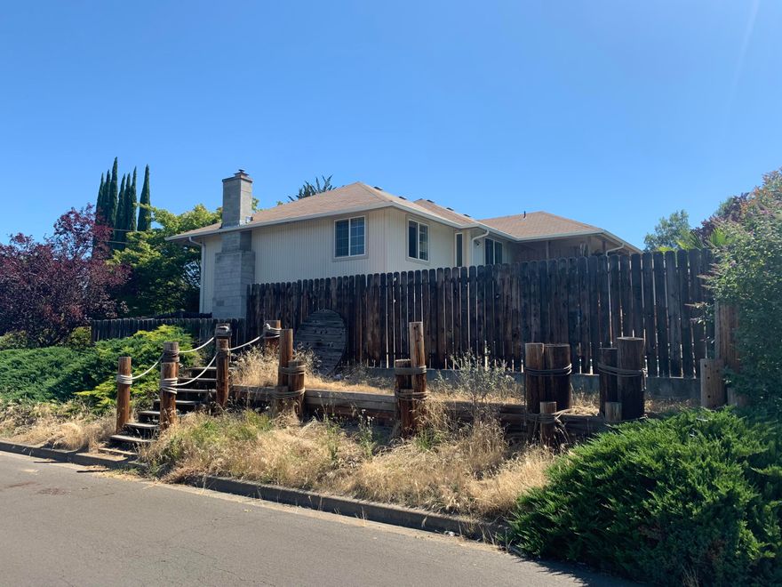 This recently remodeled large family home is ready for entertaining. Sitting on a large corner lot with area views and a separate gated entrance into the lower level ADU and inground swimming pool area. Remodeled kitchen with new recessed lighting and light fixtures, new floor, new stainless appliances, new sink, new counters and so much. 3 large bedrooms and a separate 4 room that can be used as an office or 4th bedroom. The large master suite has a walk in closet and a jetted tub in the master bath. New flooring and carpet in every room. Large covered back deck and patio area for backyard entertaining. Separate sunny garden area too. Hurry to see this one!